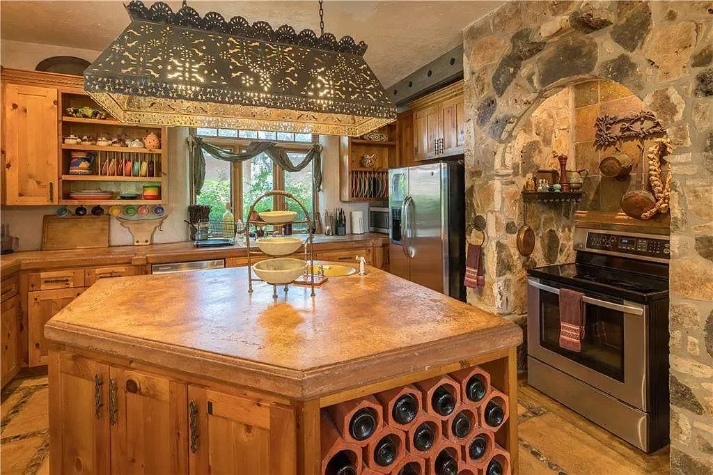 texas-hill-country-kitchen-rustic-stone-arch.webp