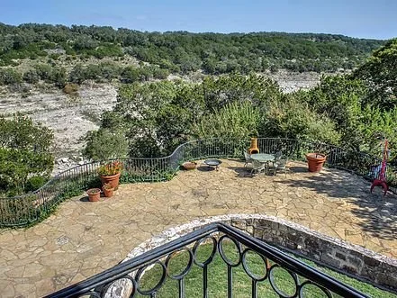 custom-home-architect-austin-stone-patio-river-view.jpg