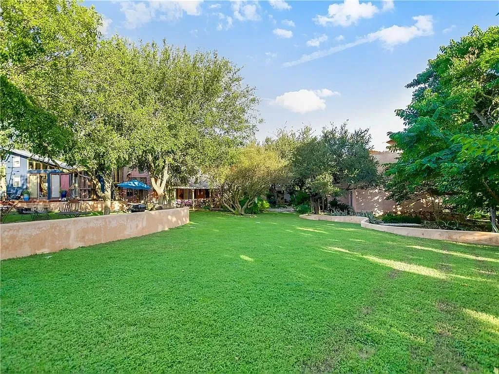 austin-luxury-residential-backyard-lawn.webp