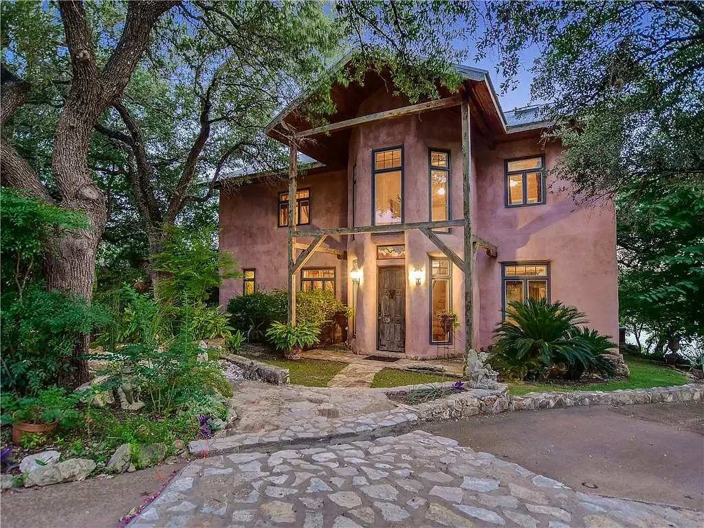 luxury-austin-hill-country-stucco-home-entrance.webp
