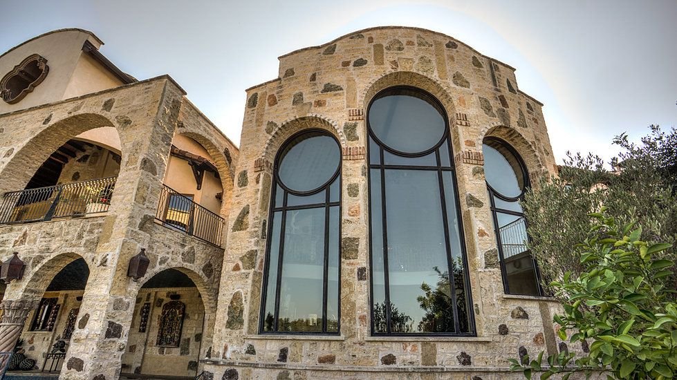 custom-home-architect-austin-stone-facade-windows.jpg