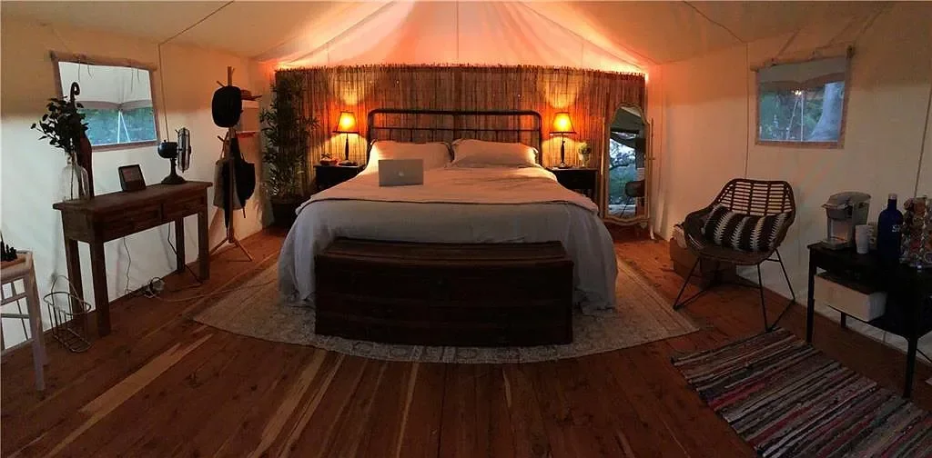 texas-hill-country-luxury-glamping-tent-bedroom.webp
