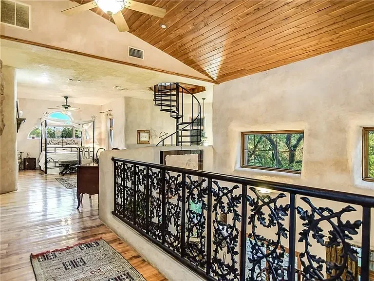 texas-hill-country-luxury-home-iron-railing.webp