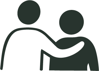 Silhouette of two people with one person comforting the other.