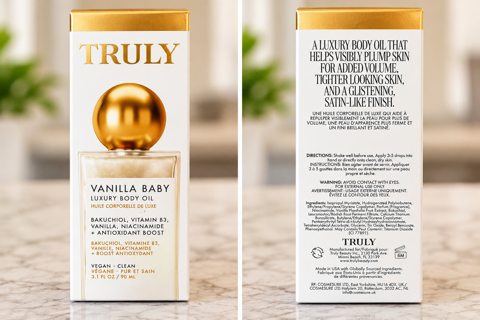 Front and back view of a box of Truly Vanilla Baby Luxury Body Oil with gold and white packaging, featuring a gold ball on top of a clear bottle and detailed product description and instructions.