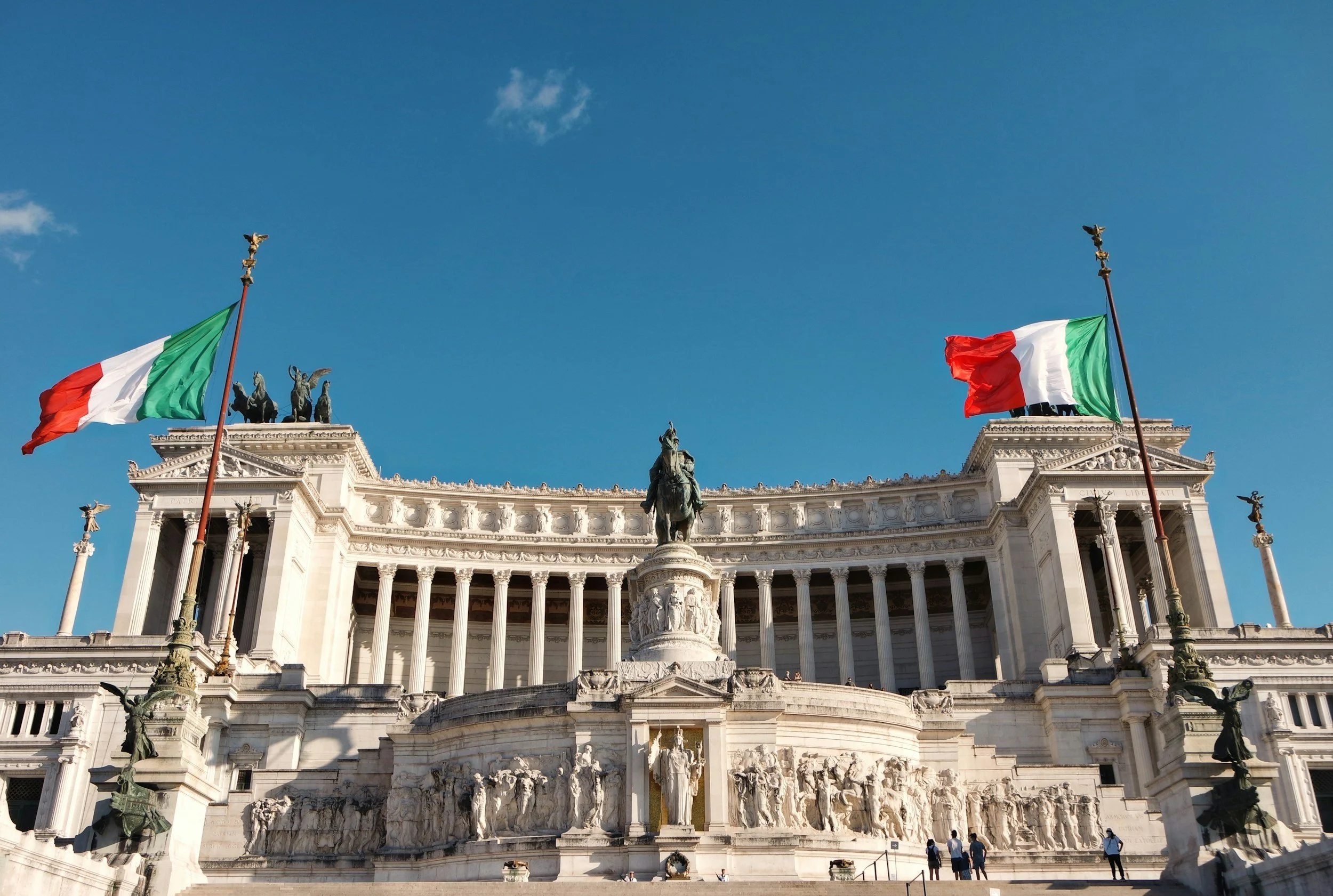 Italy's parliament with italian flags on either side