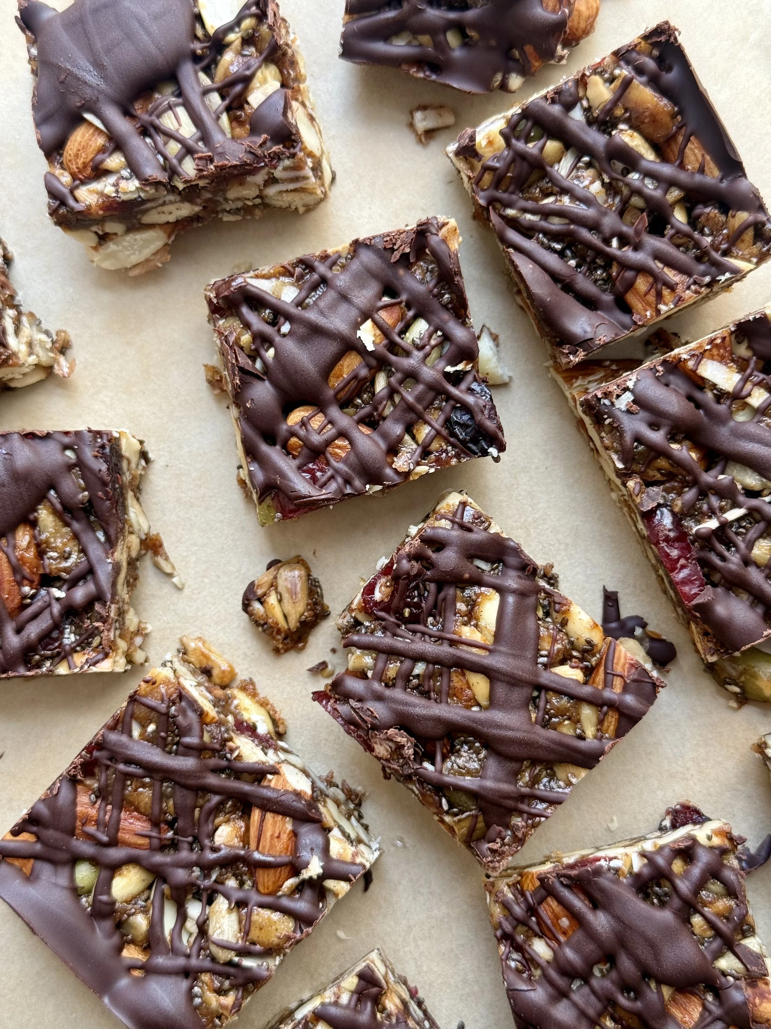 Granola bars with a dark chocolate drizzle