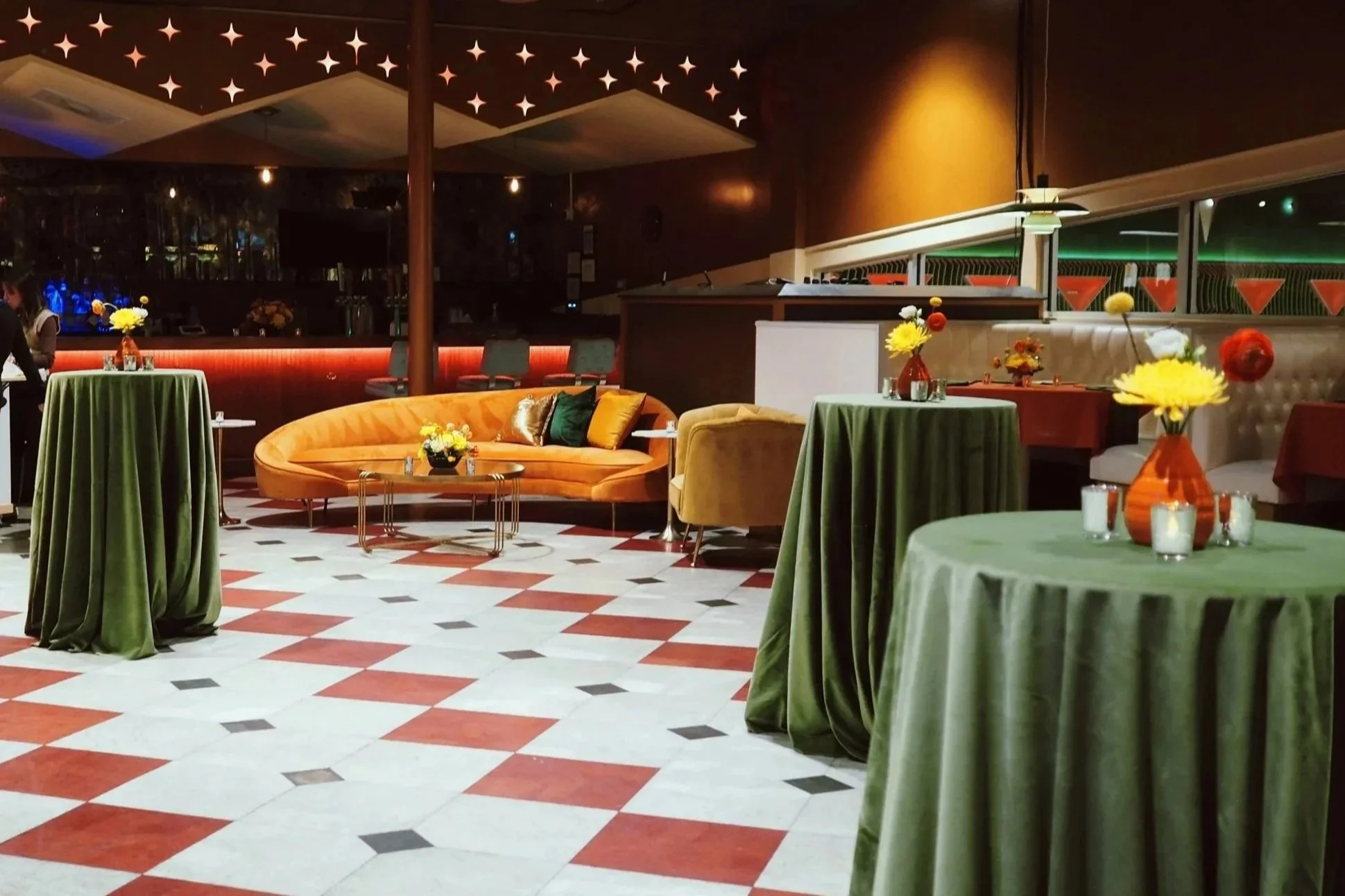 Retro velvet linens and soft seating for holiday party
