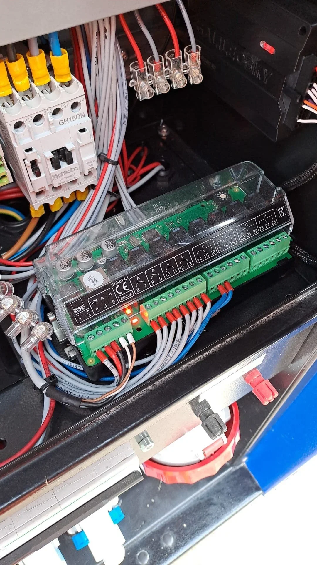 Generator control panel wiring with green terminal blocks