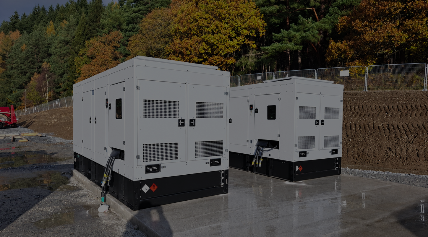 Two industrial diesel generators installed by MKG Engineering Services on a concrete pad