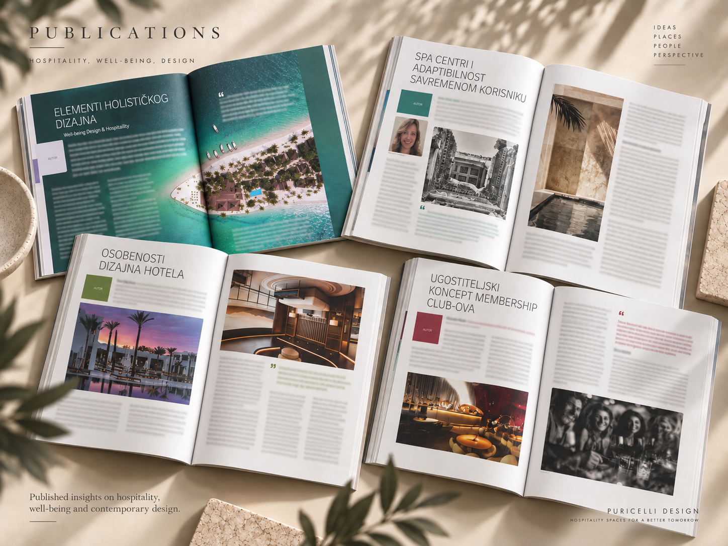 Open magazines on hospitality, hotel design, and space concepts, displaying images of a resort, hotel lobby, and lounge interior, with text in various languages.