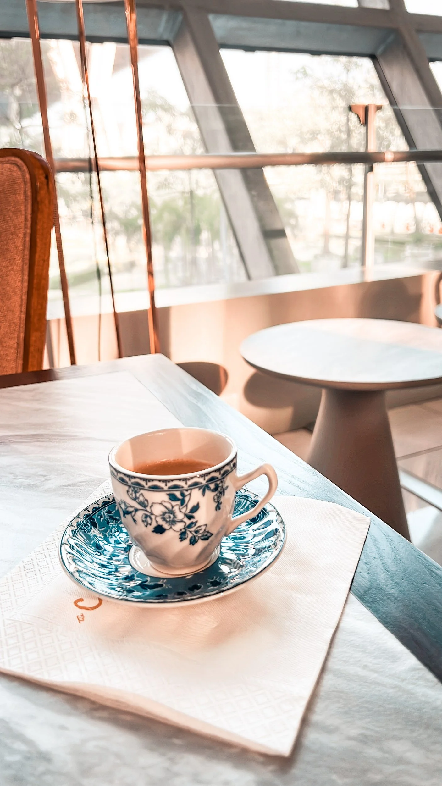 4 FoodDrink Bangkok Tea cup at window 2022.jpg