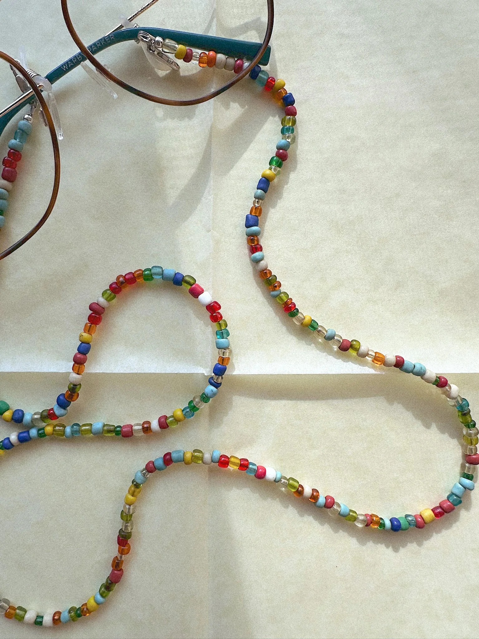Image of reading glasses with multicolor bead chain