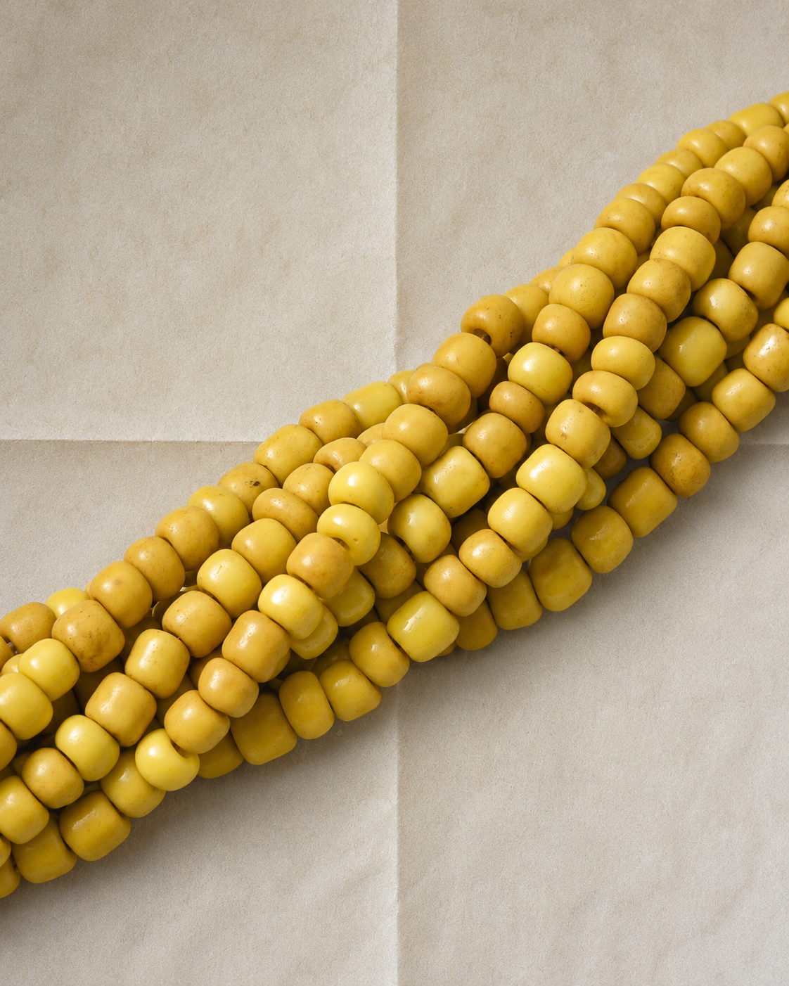 overhead of yellow beads