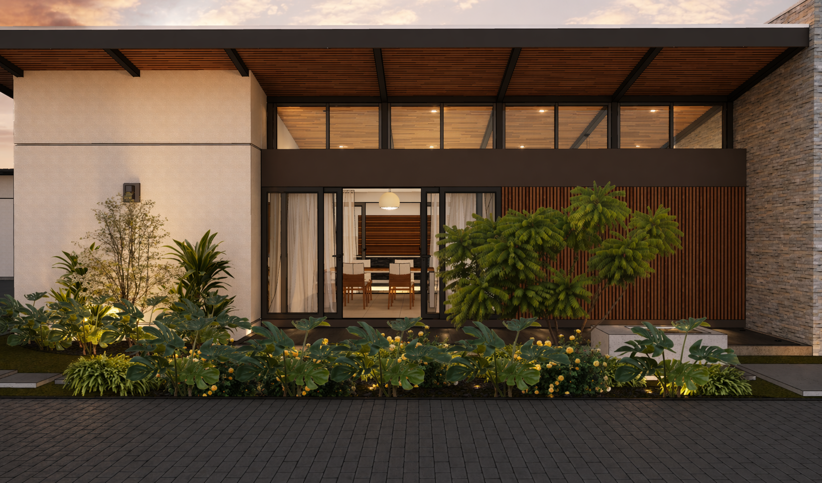 Modern house with large windows, a garden with various plants and trees, and warm interior lighting visible from outside, during dusk.