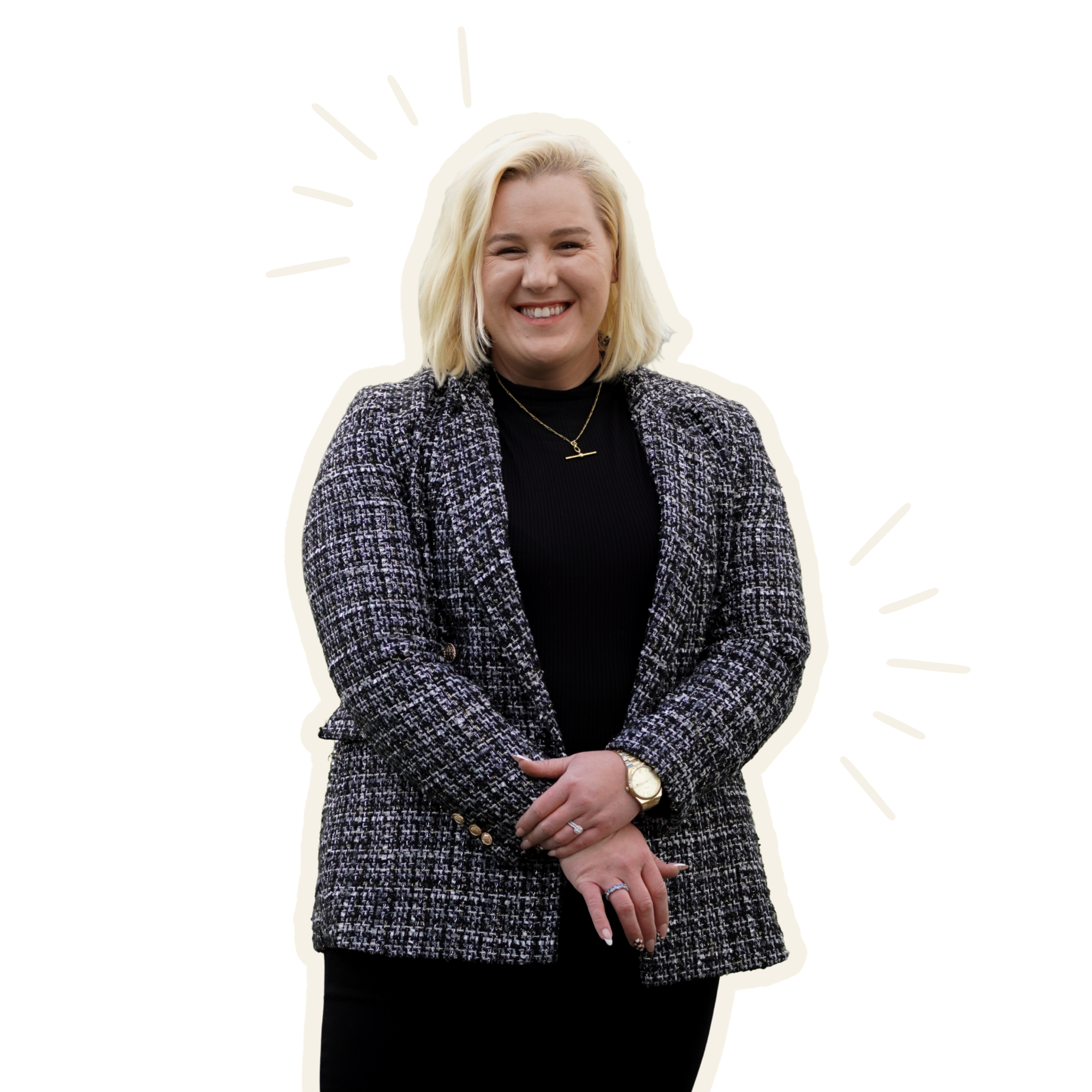 Portrait of a young woman with shoulder-length blonde hair, smiling, wearing a black top, a patterned black and white blazer, and black pants with her hands crossed, smiling at the camera. There are cream lines showing emphasis on her left and right.