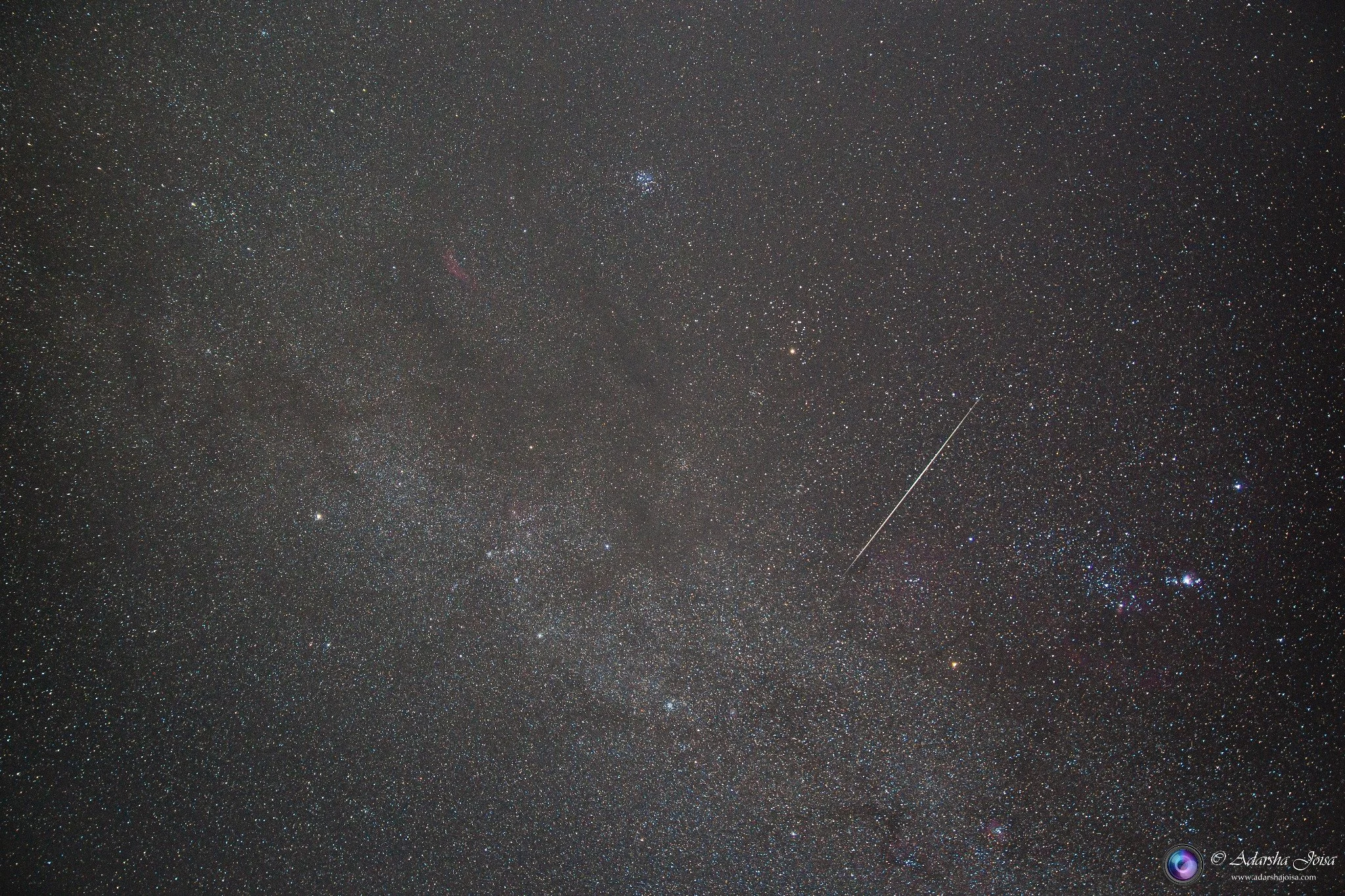 Geminid meteor across the Milky Way