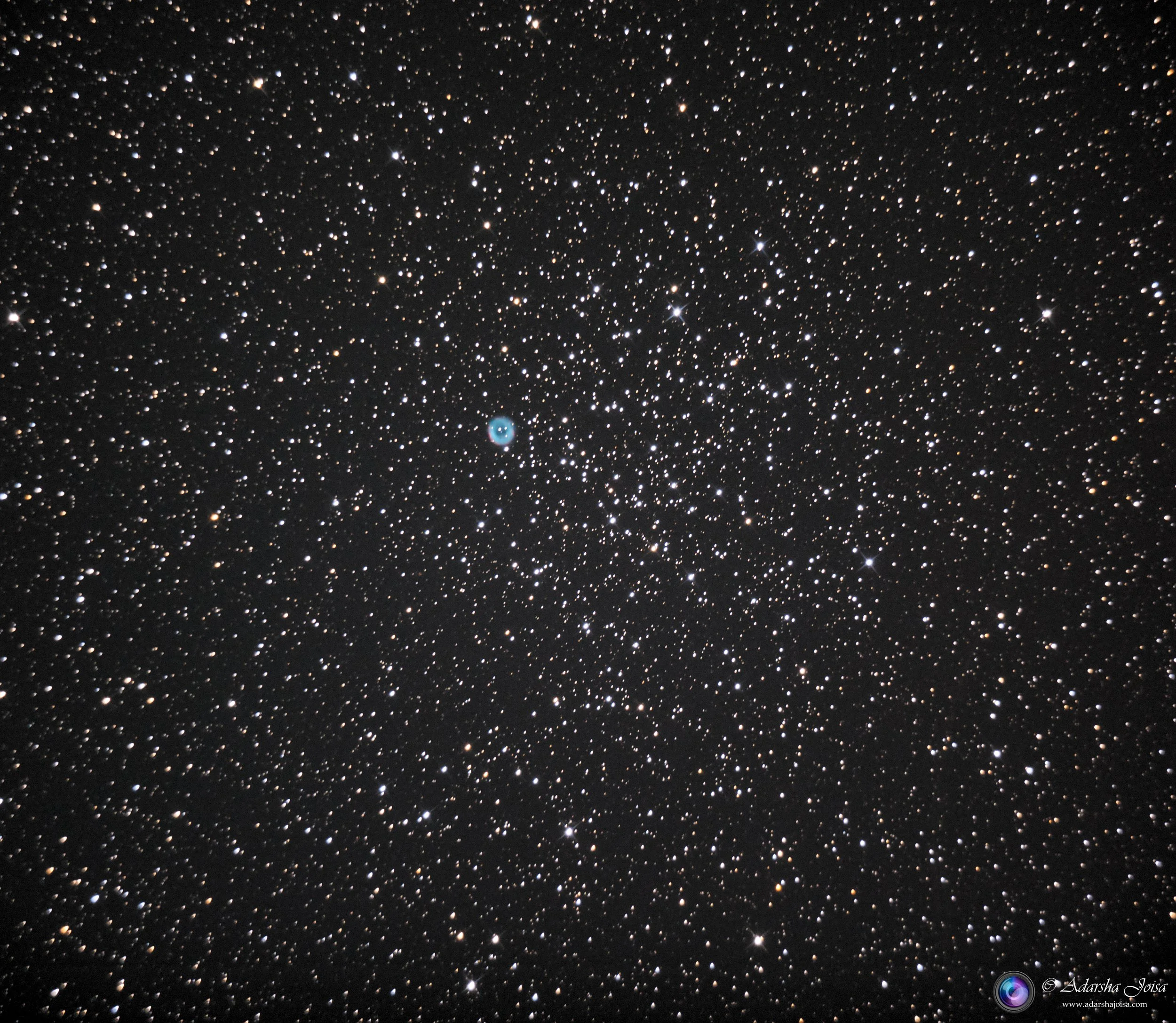 A Planetary nebula in a star cluster
