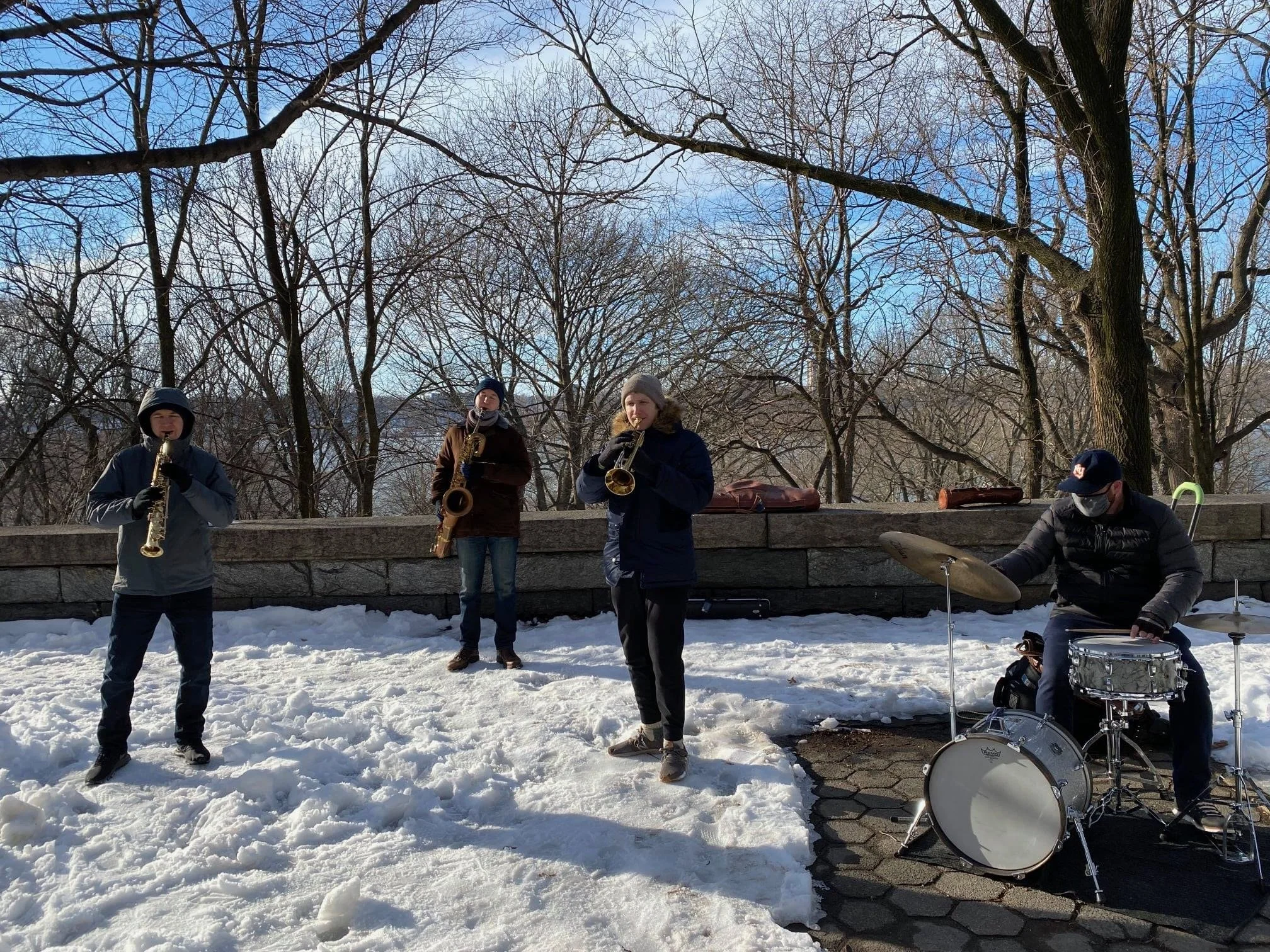 performing with the Anderson Brothers outside of Duke Ellington's house, where they performed together every week throughout the 2020-2022 Covid shutdowns