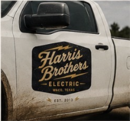 A white pickup truck with a black graphic decal on the door that reads 'Harris Brothers Electric, Waco, Texas, Est. 2013'.