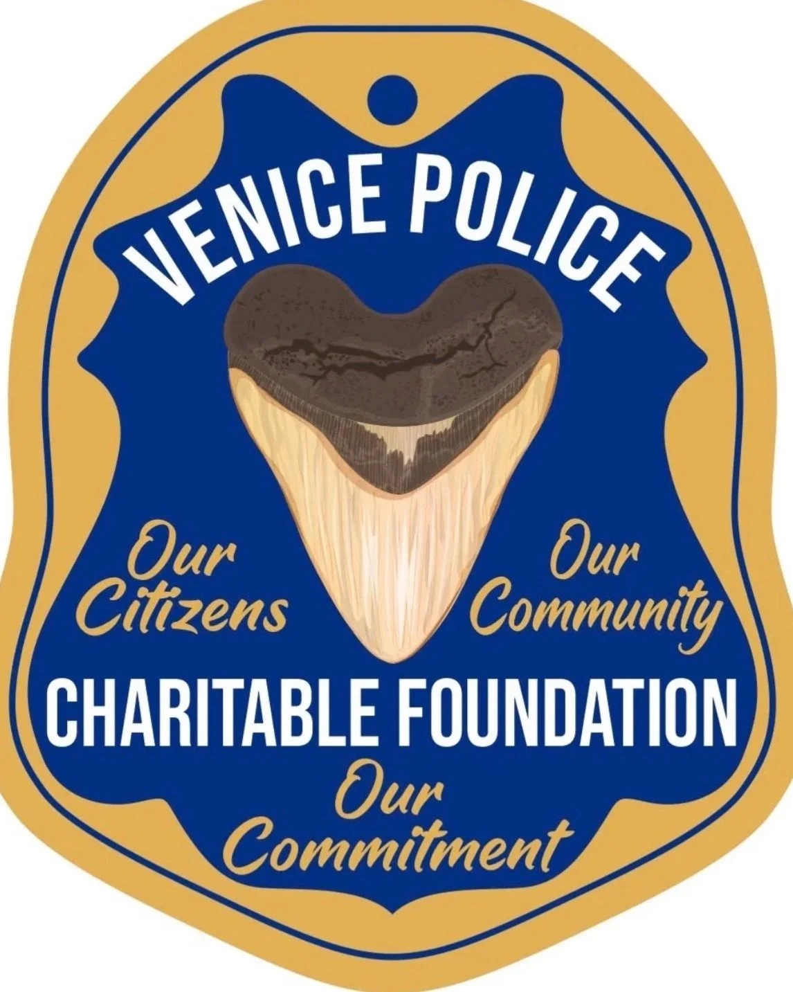 A badge with a blue background and gold border featuring a shark tooth image in the center. The text reads 'Venice Police,' 'Our Citizens,' 'Our Community,' 'Charitable Foundation,' and 'Our Commitment.'
