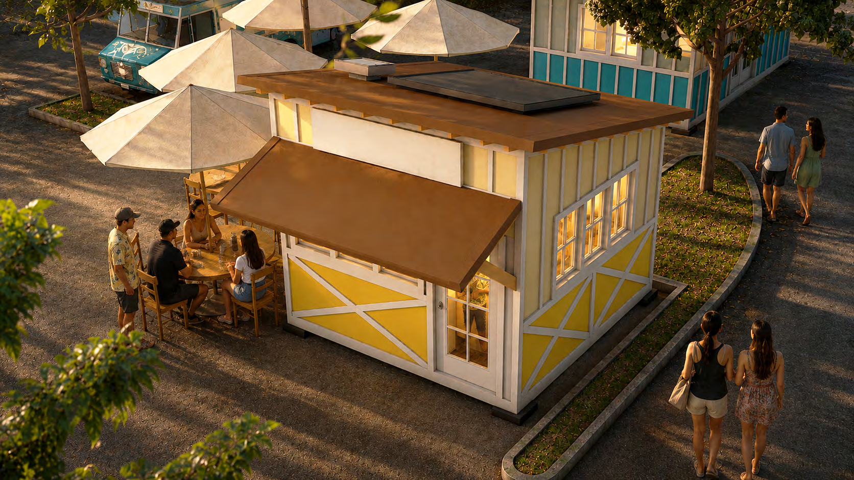 Yellow storefront at ʻUlu o Lele, with a brown awning and outdoor seating.
