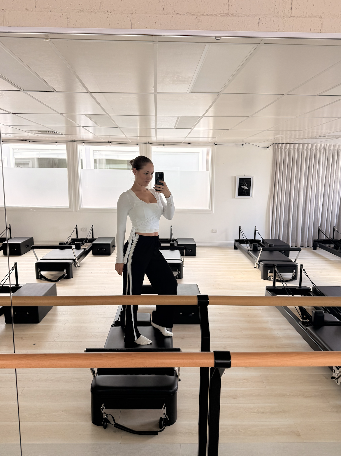 Pilates instructor Brooke in a Reformer Pilates studio in Bowral.