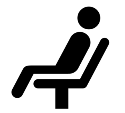 Silhouette of a person sitting in a chair, leaning back with legs extended.