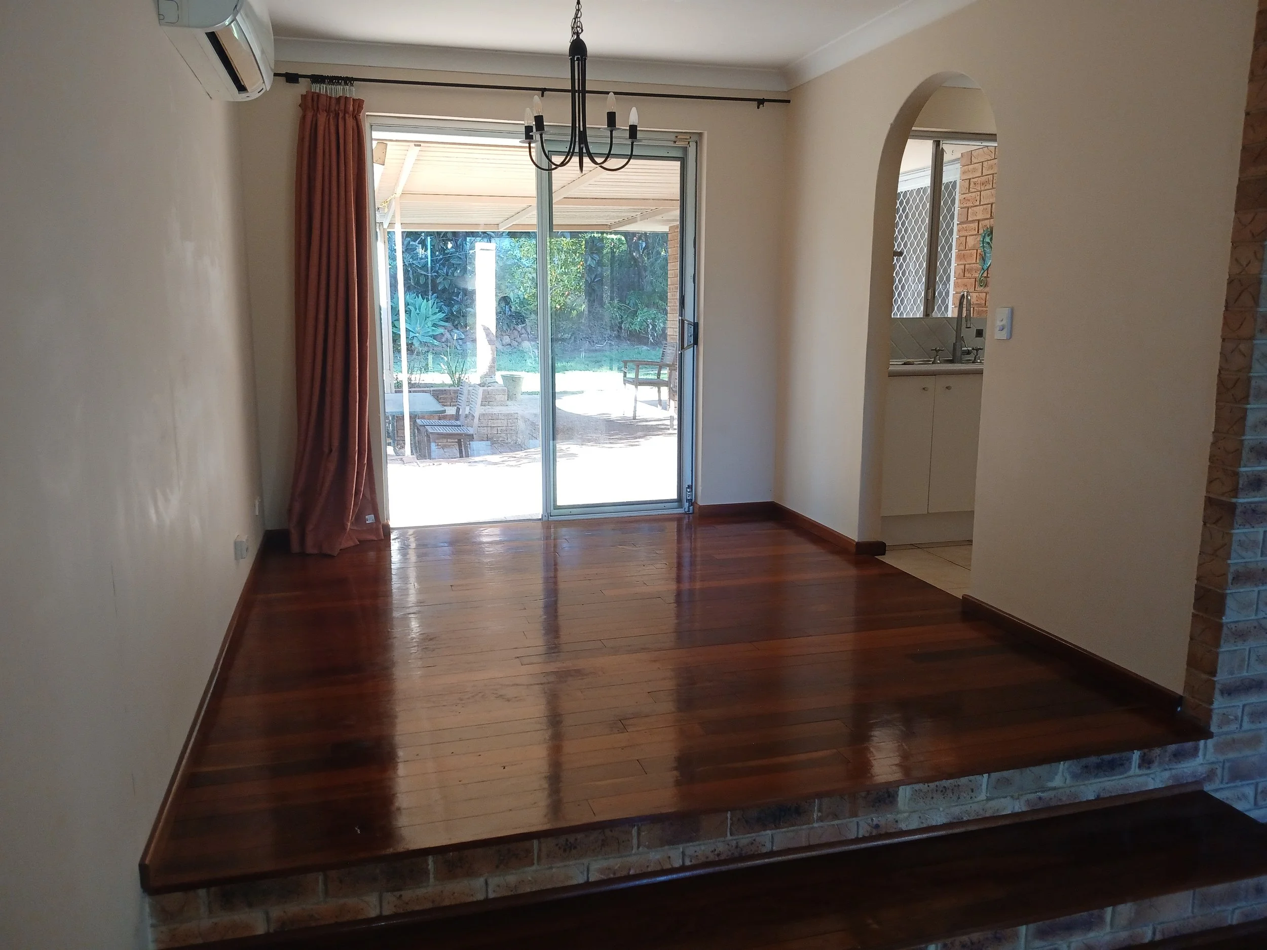 Reclaimed hardwood floor with hidden nails on concrete, after 20 years.
