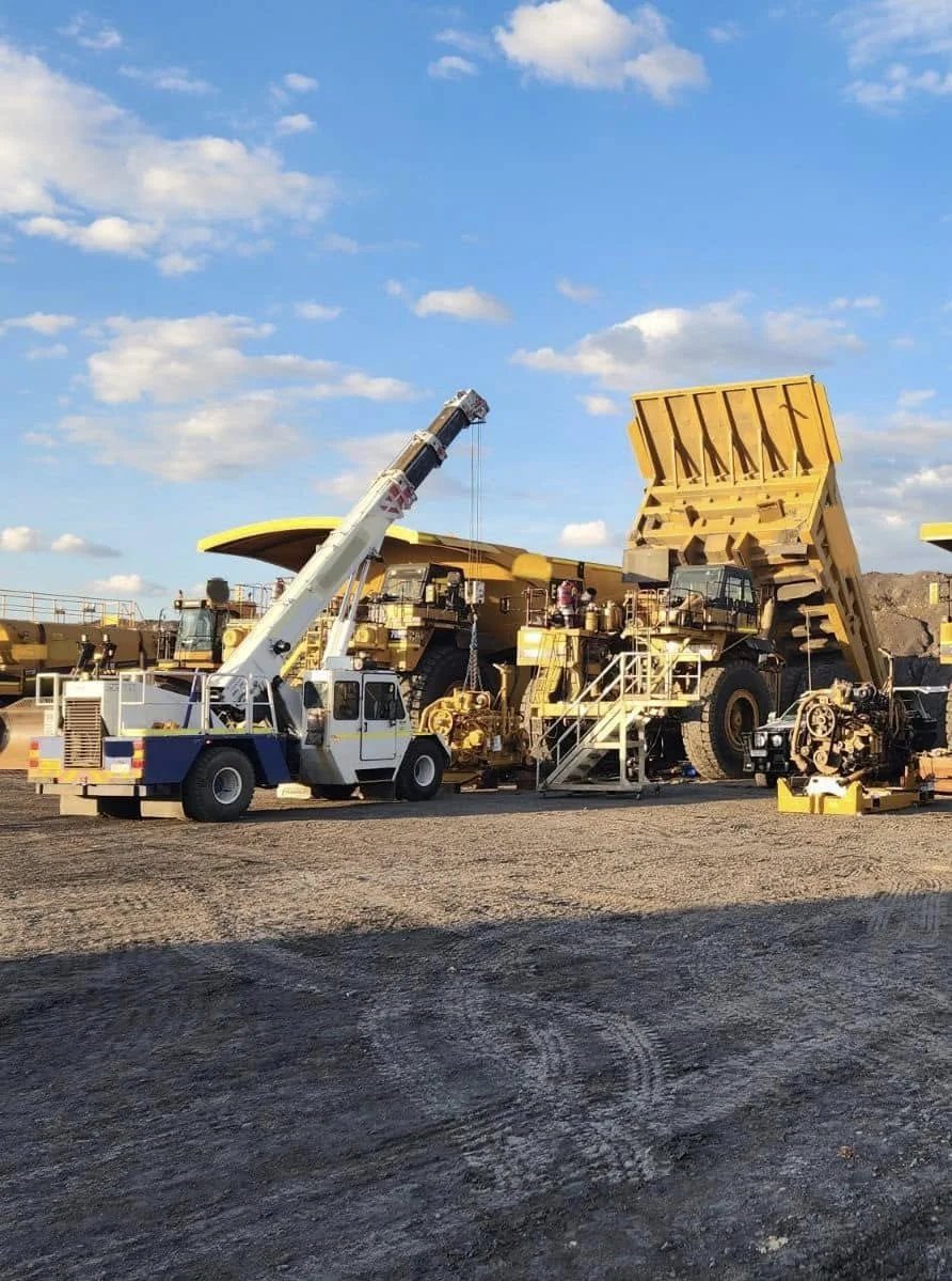 CWS Franna crane operator and crew during haul-truck maintenance on a Queensland mine site