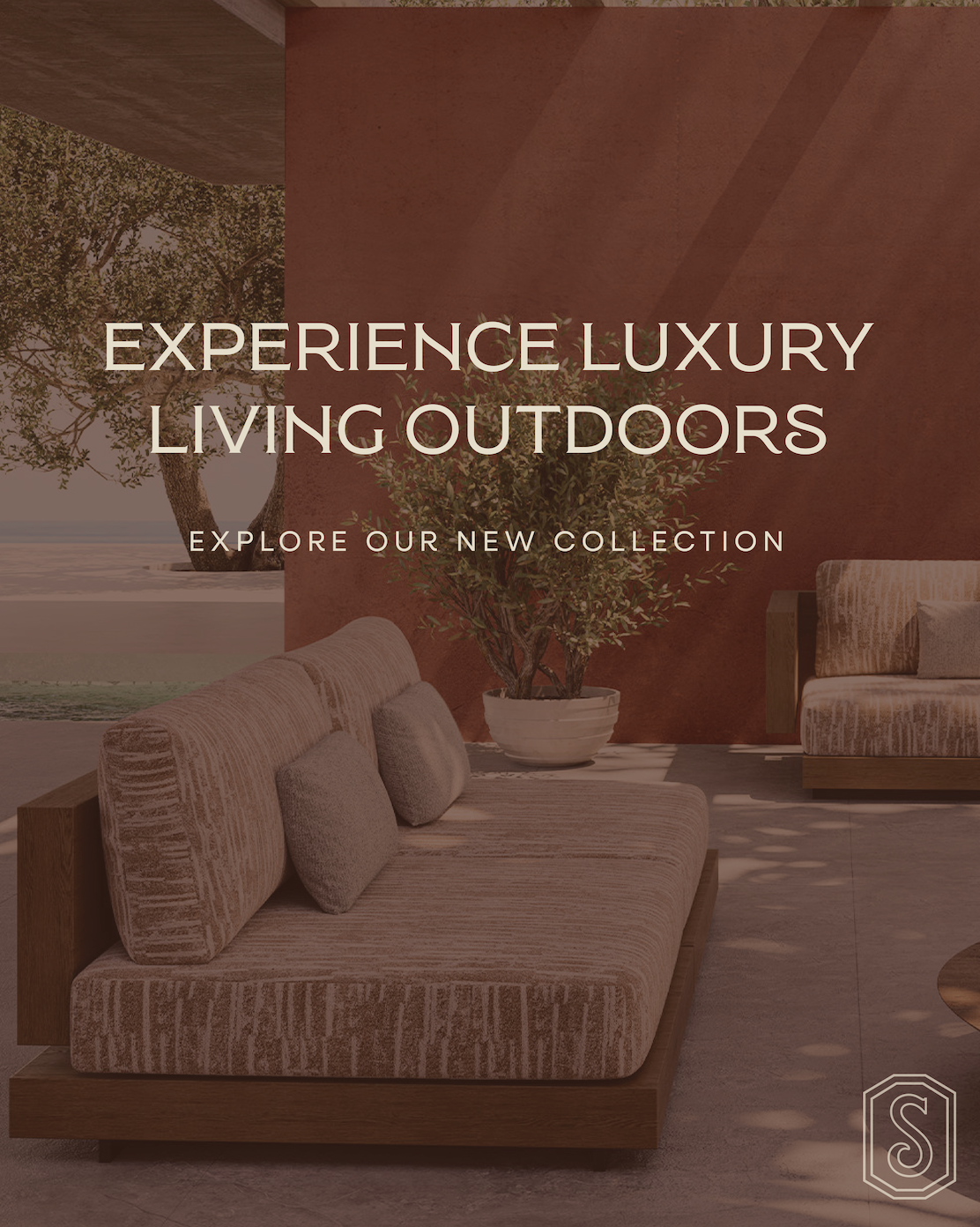 Interior of a patio with cushioned seating, potted plant, and view of a tree and ocean outside, promoting luxury outdoor living furniture.