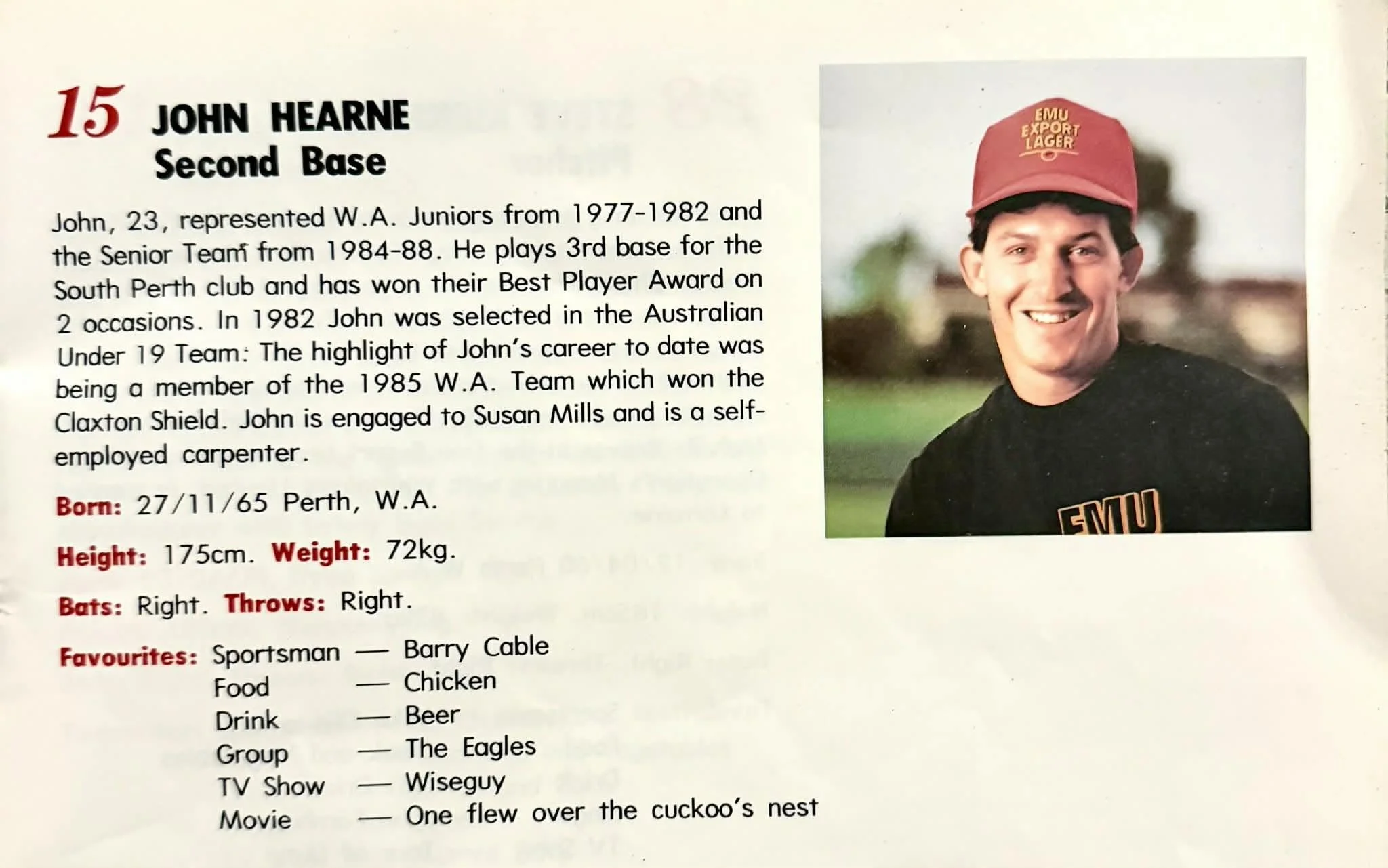 A page from a sports memorabilia display featuring a photograph of a young man in a red cap and black shirt, smiling, with accompanying text detailing his career and personal information.