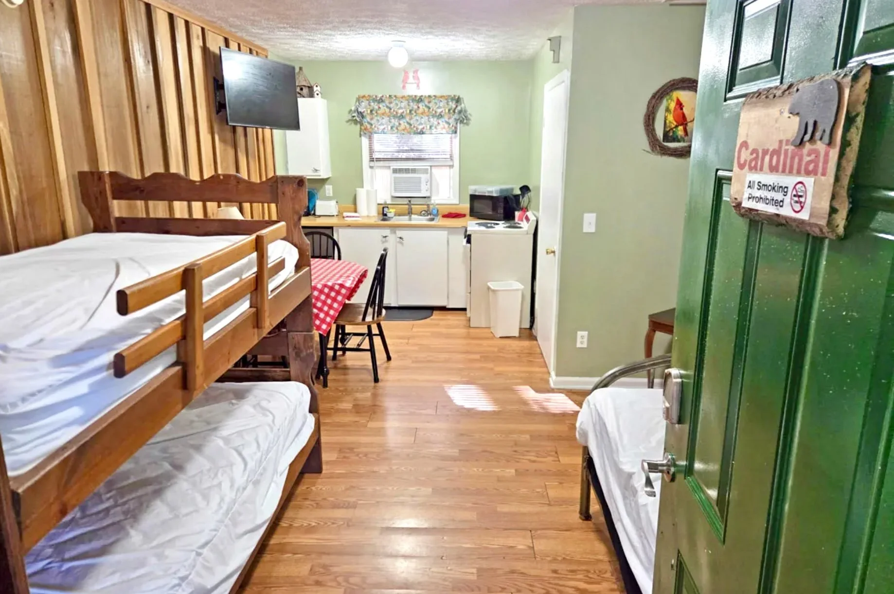 Beds, dining area and kitchenette