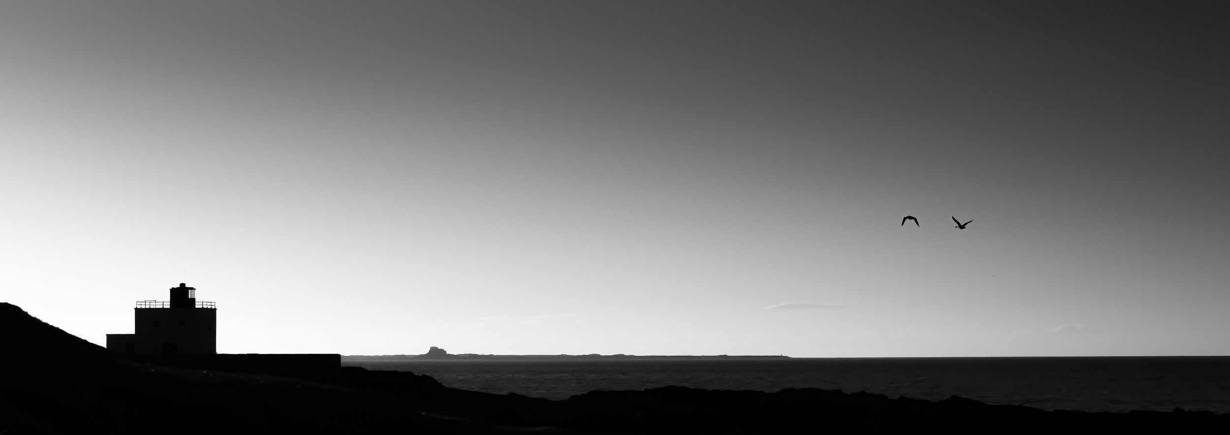 Bamburgh lighthouse side profile b&w.jpg