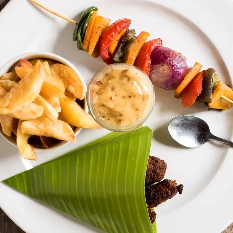Fish fingers and vegetable skewers served at the Funky Mango Restaurant, Lake Shore Lodge.