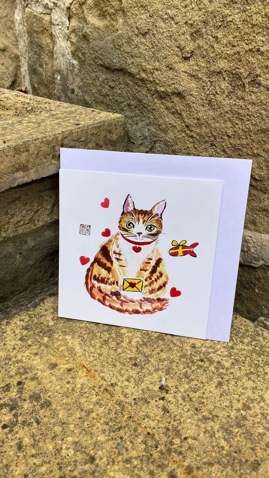 Ginger cat with hearts - greeting card.jpeg