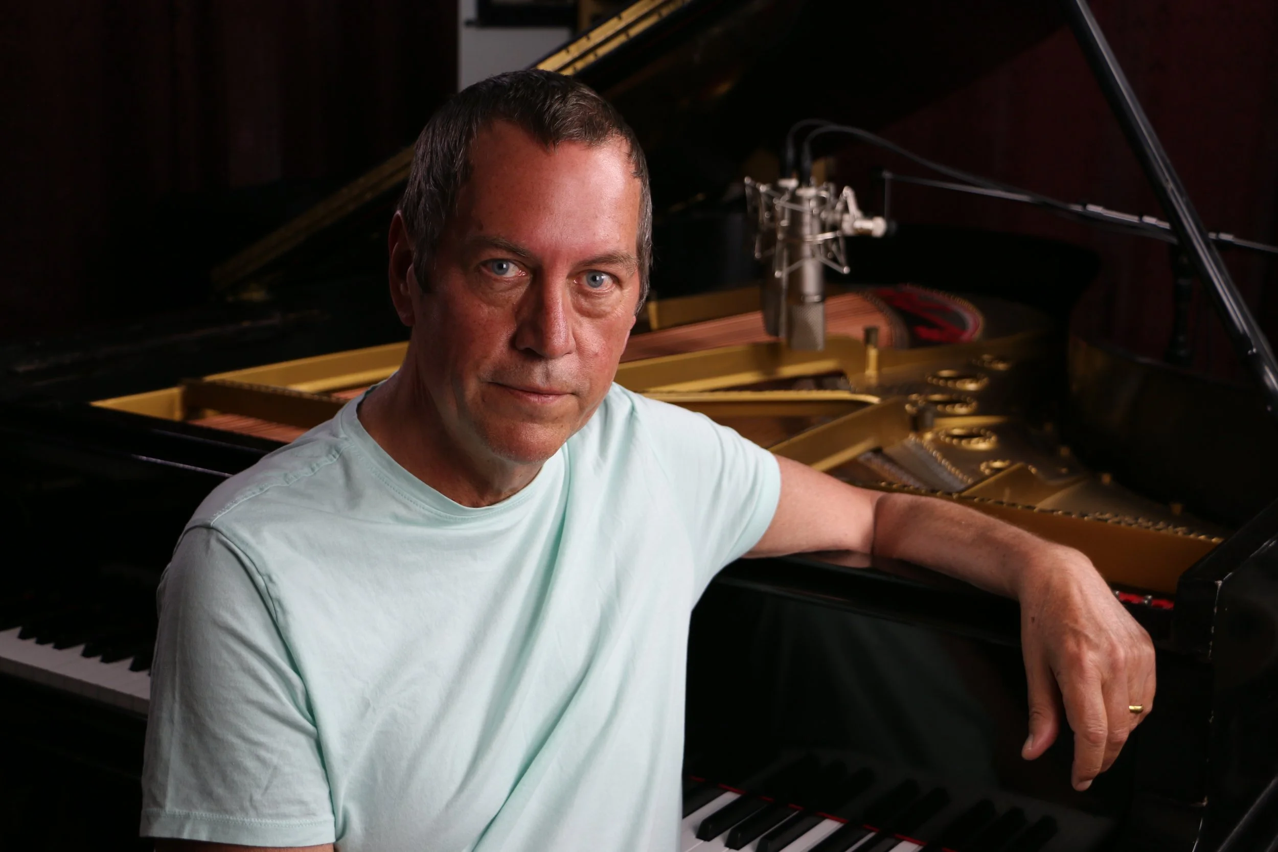 Russ with pianowith keys copy.JPG