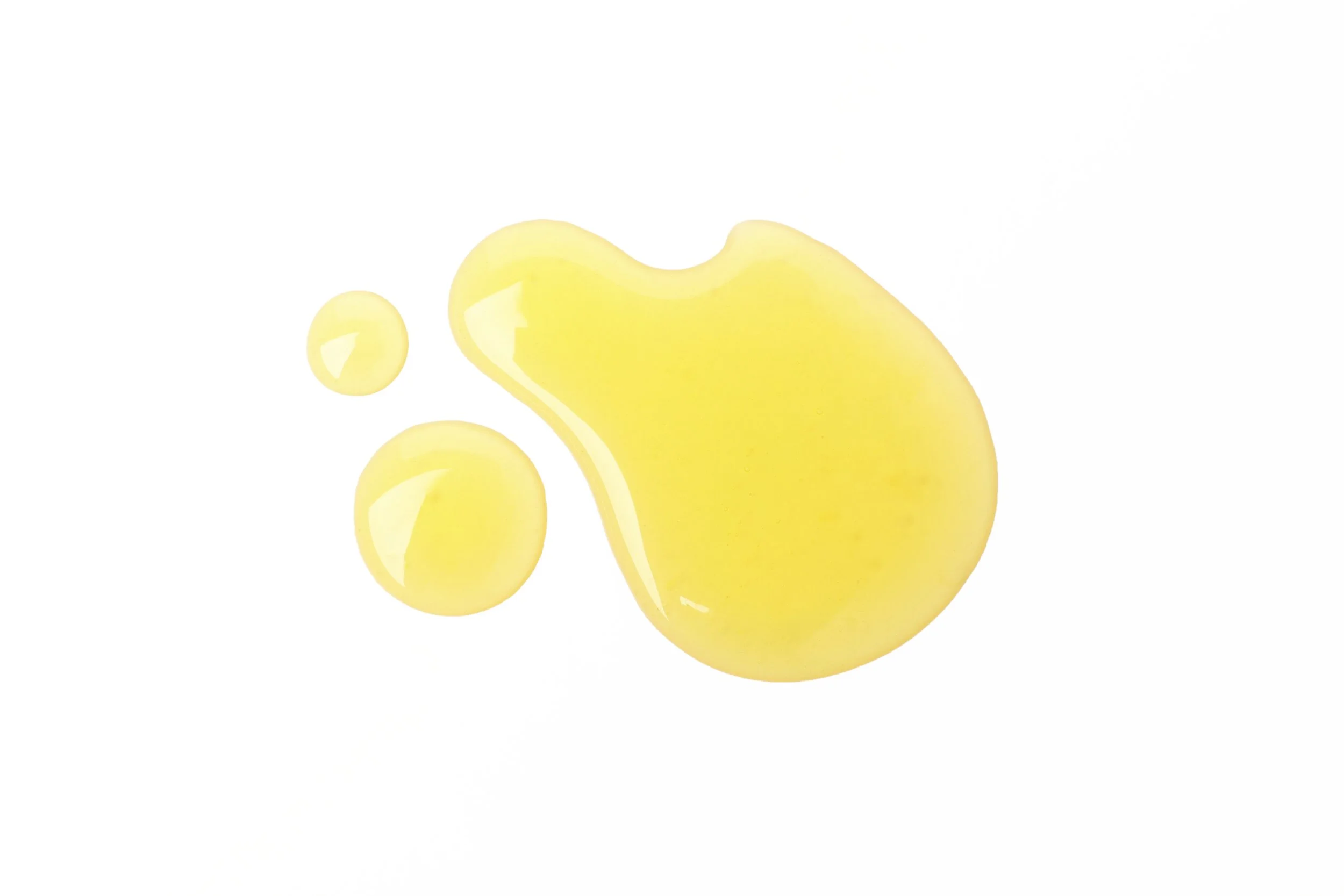 abstract-yellow-liquid-droplets-on-a-white-backgro-2026-03-24-23-20-50-utc.jpg