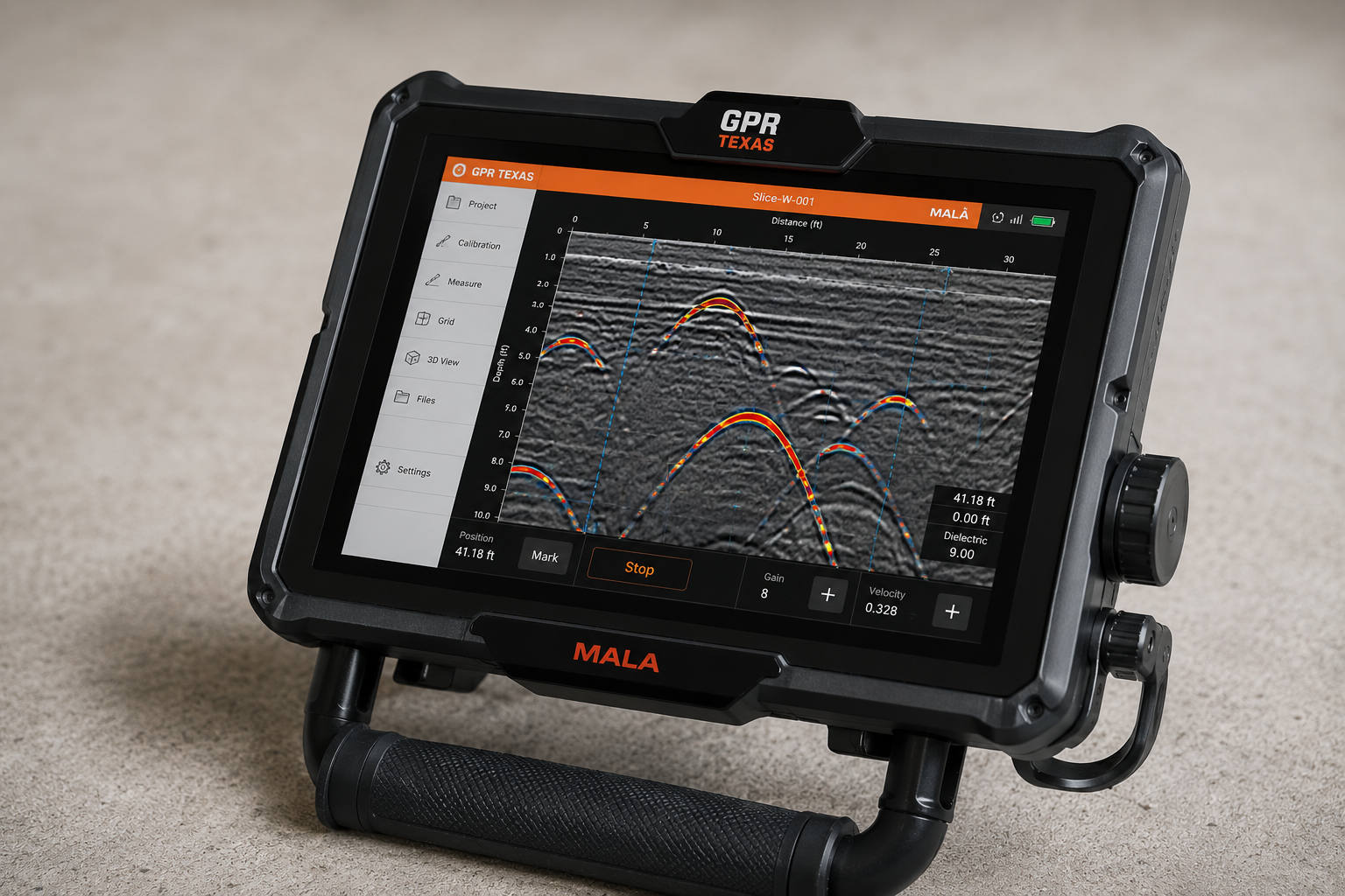 A handheld GPR device displaying underground scan data on a screen with various controls and settings.