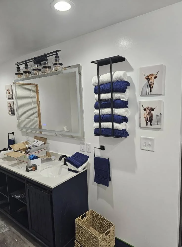 Vanity and mirror in the new full bathroom