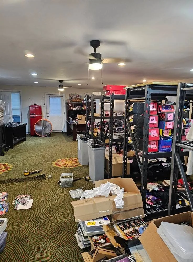 Open storage room with old casino carpet before the conversion