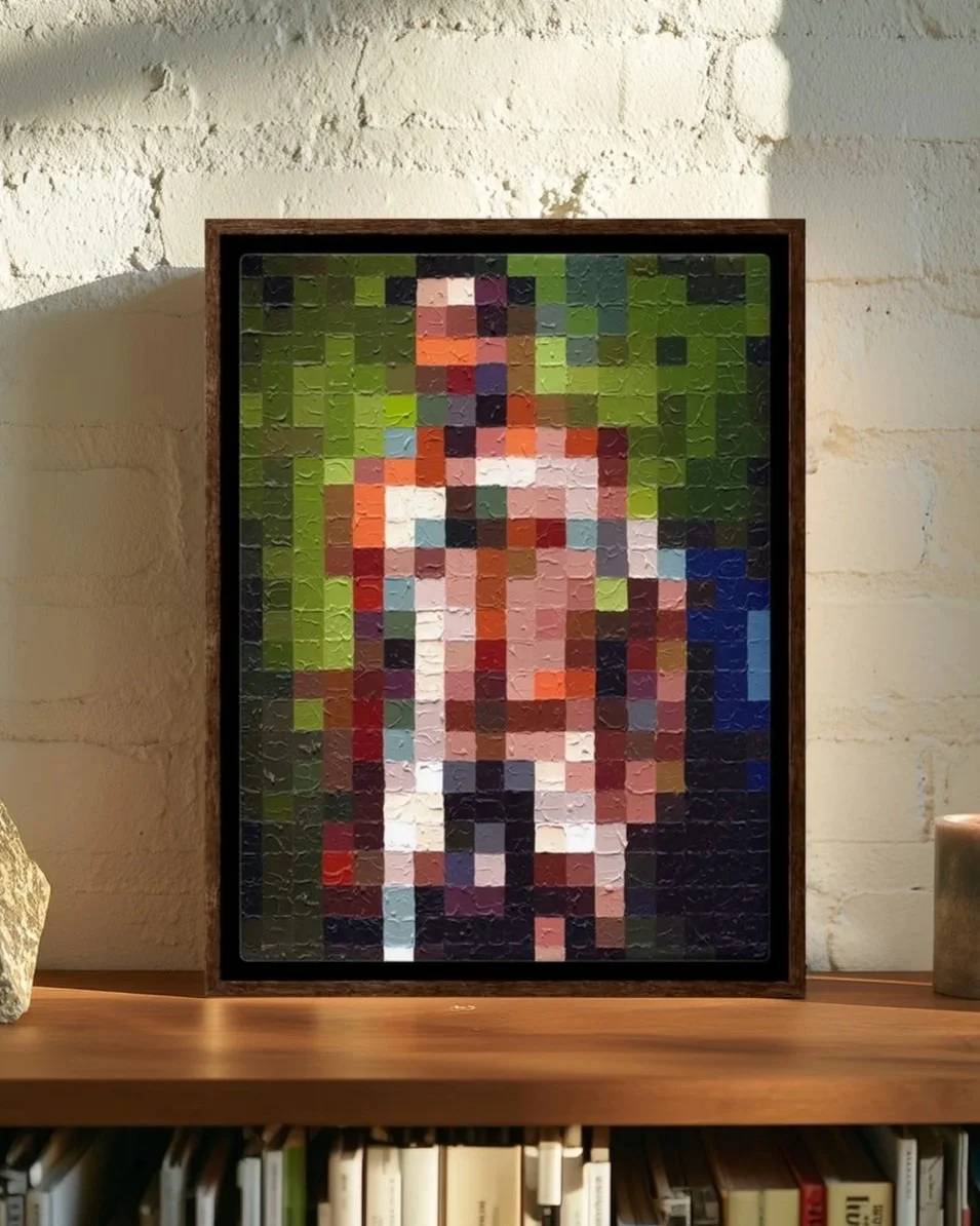 Pixelated portrait of a nude man standing in front of a green background, framed and placed on a wooden surface.