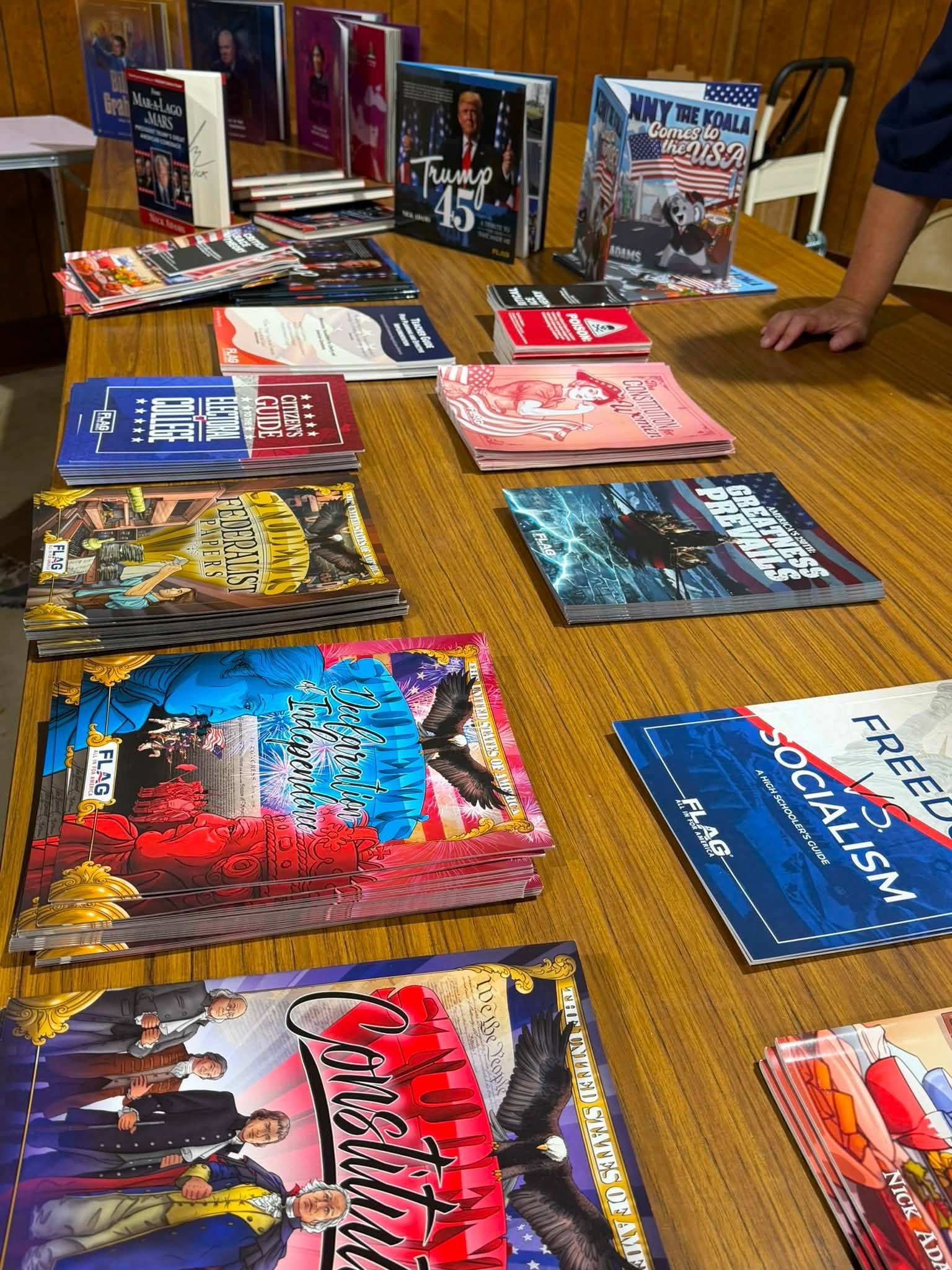 Table displaying various political pamphlets, books, and promotional materials, including titles related to US political figures, elections, and patriotic themes.