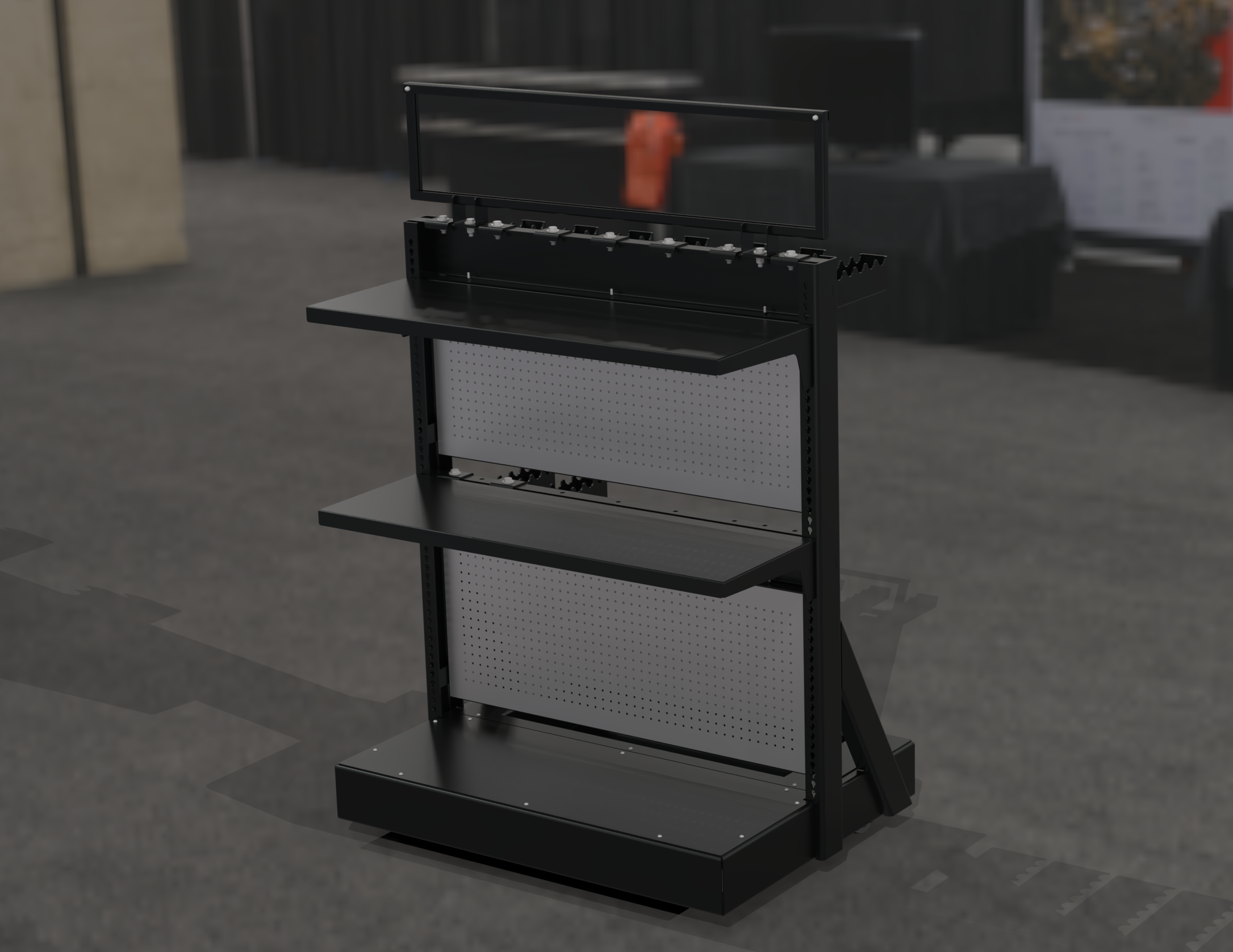 A black shelving unit with multiple levels and a glass display case frame on top, situated indoors on a gray tiled floor.