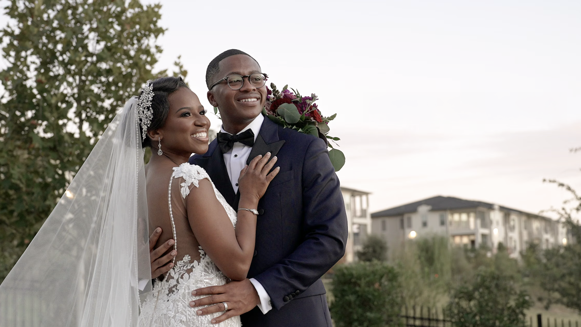 Wedding couple embrace for a sunset photo