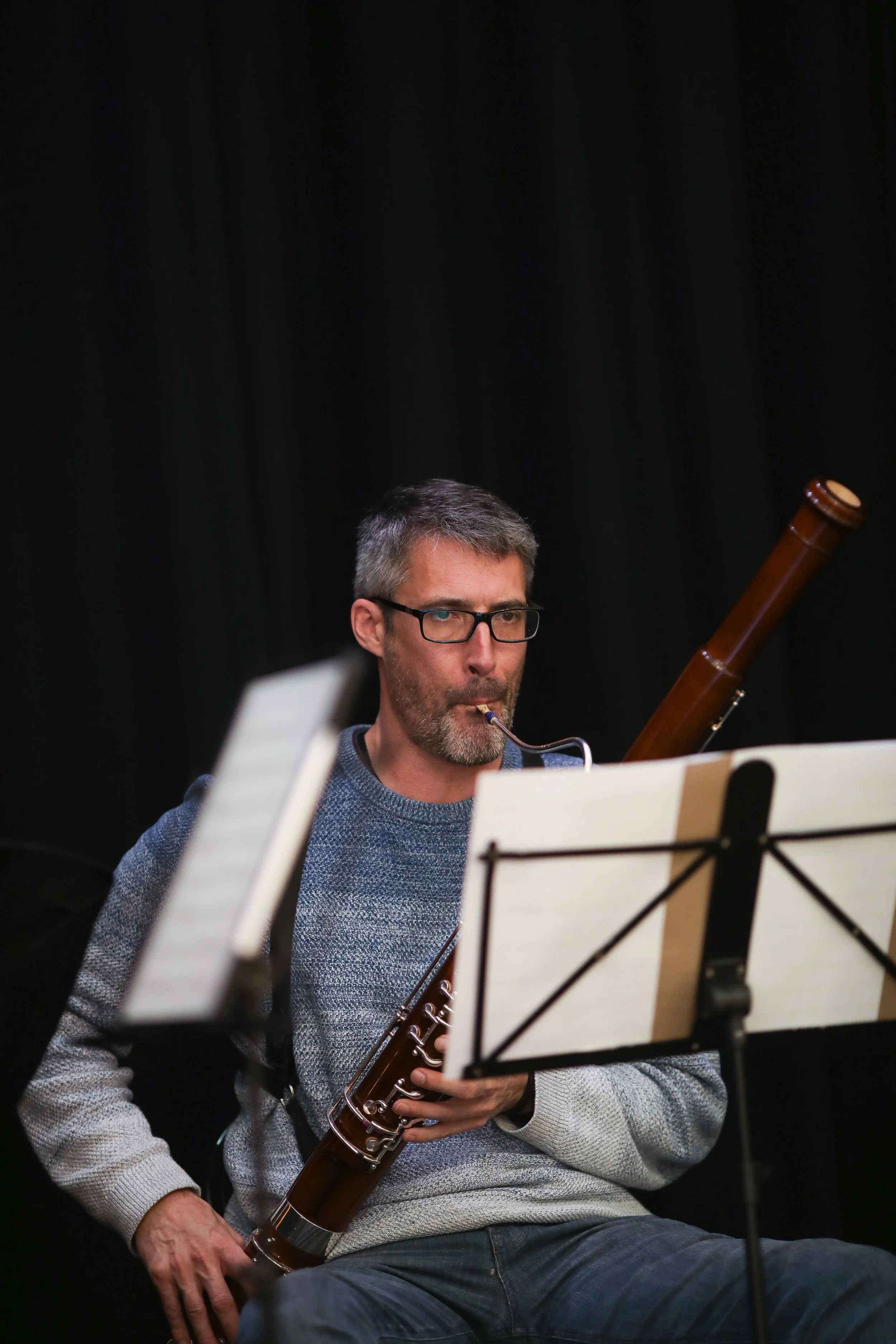 Howard playing bassoon during an Arundo5 rehearsal.
