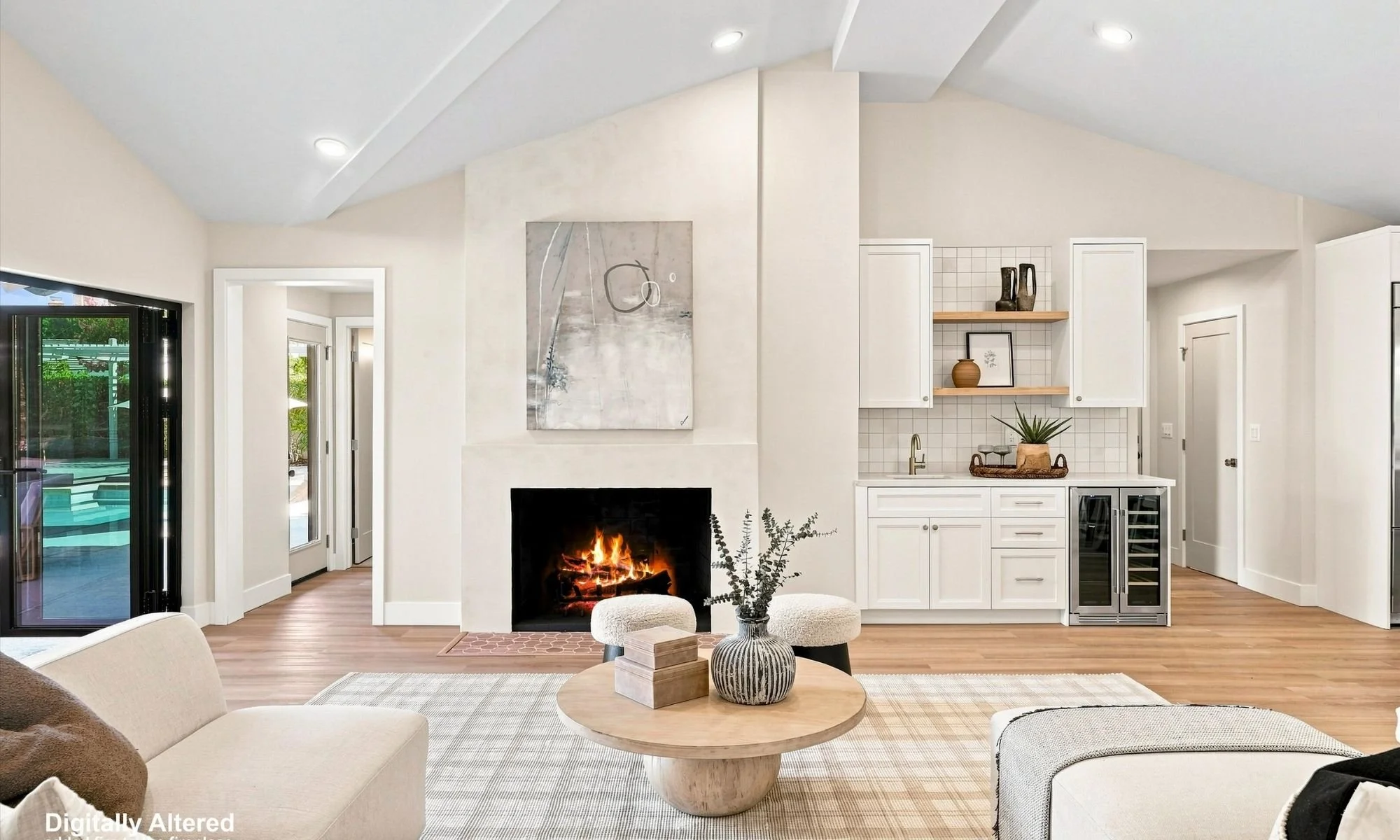 Kelly Rhee's Listing in North Tustin. Staged family room that opens to the backyard. This custom built home in Saint Hubert Woods Estates was staged by intuitive design.