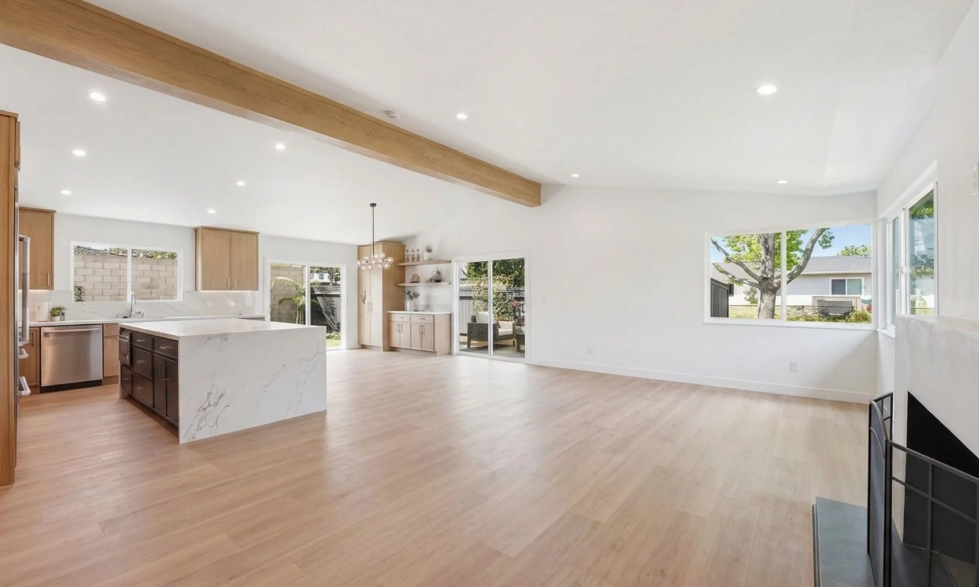 Kelly Rhee's listing in the inner loop of Mesa Verde, Costa Mesa. Same great room un staged. Without it buyer's have a hard time visualizing furniture placement and flow of the room.