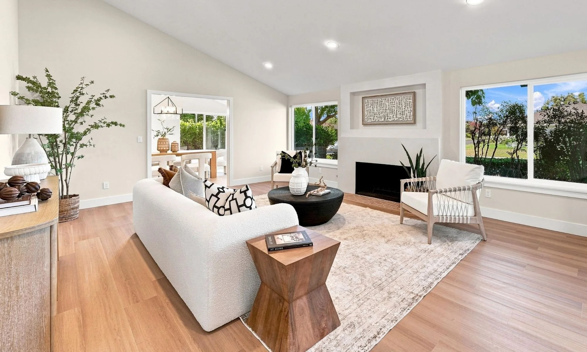 Kelly Rhee's North Tustin Listing in Saint Hubert Woods Estate. Picture of the formal living room shown staged by Intuitive Design