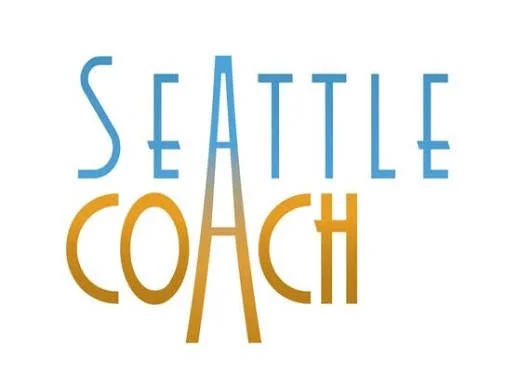 SeattleCoach logo, linking to the ICF-accredited coach training program where Mikey is completing his professional certification.